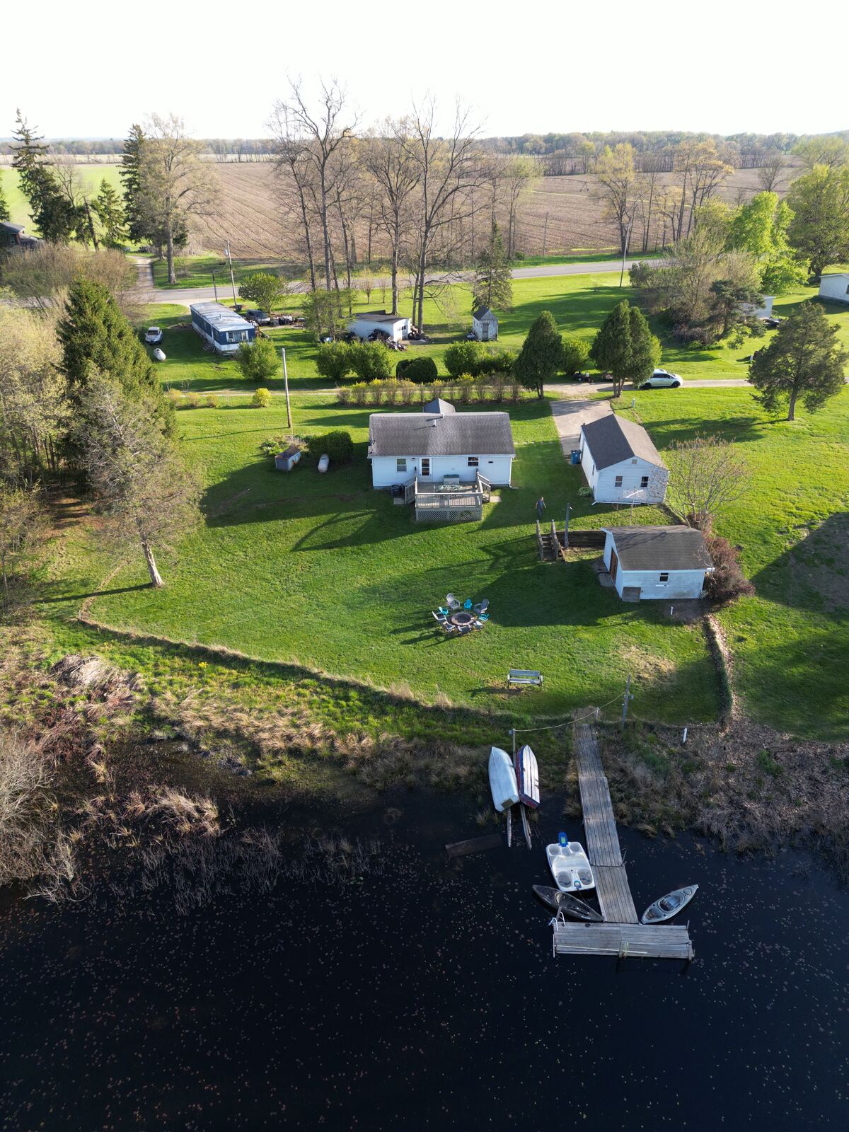 Aerial photo of lakeside properties and docks