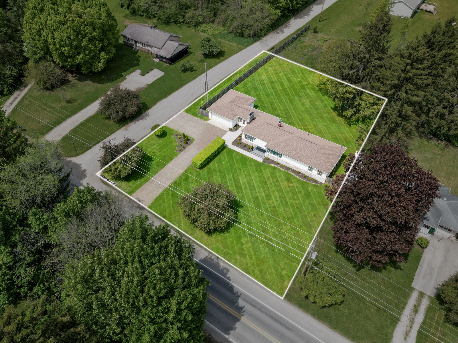 Aerial photo with property boundary lines drawn