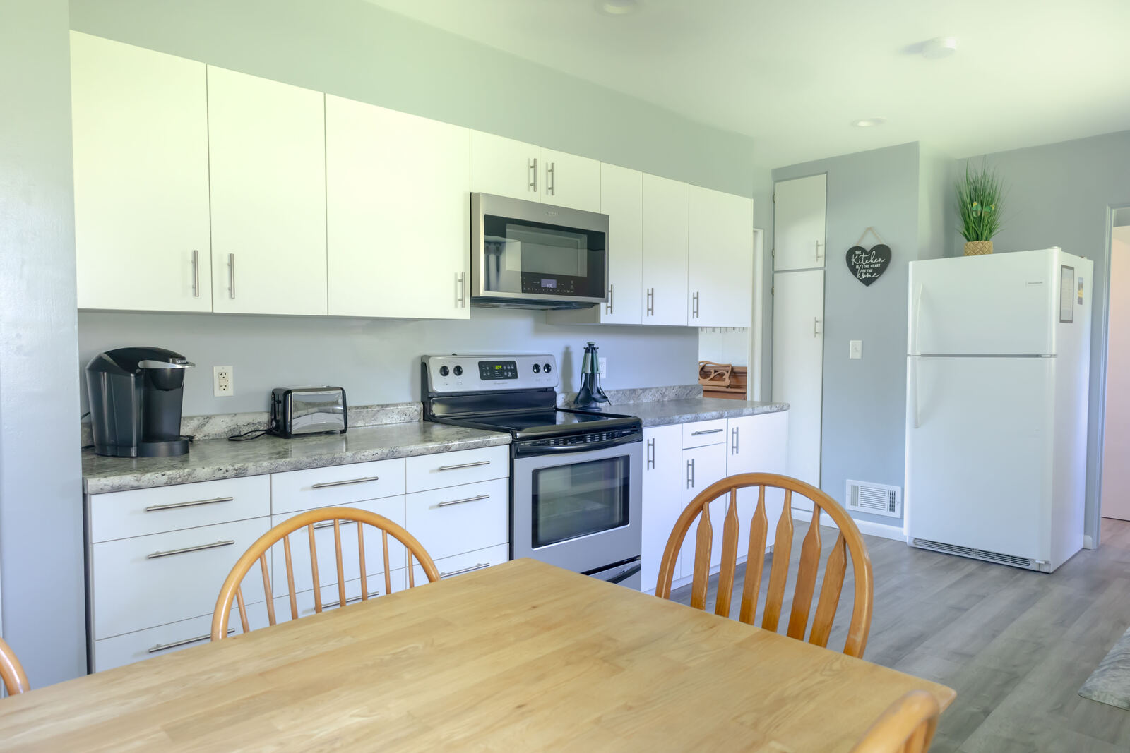 Bright kitchen with white cabinets